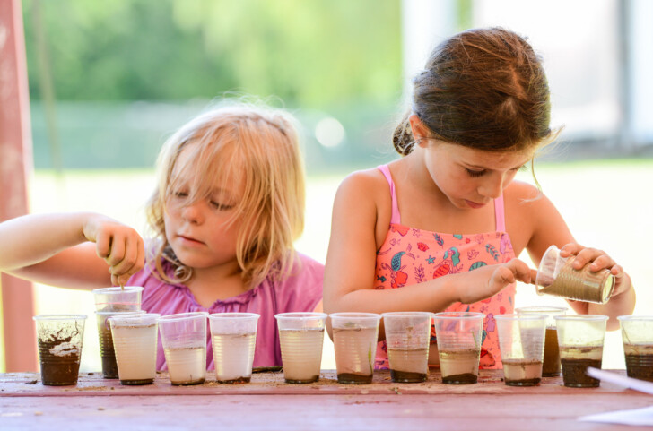 Two campers working on an activity.