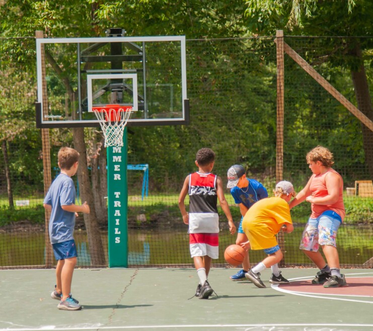 Campers playing basketball.